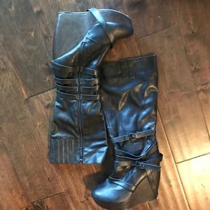 Strappy black platform boots